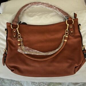 Brown faux leather handbag